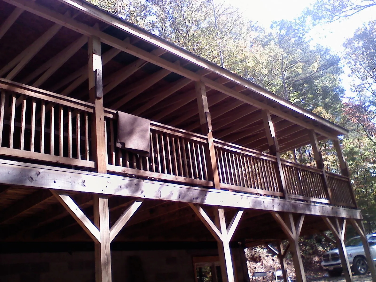 Timber framing under a new elevated porch and deck — Roof Leak Repair in Worthington Springs by Roofing Brothers